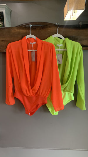 green and orange bodysuit